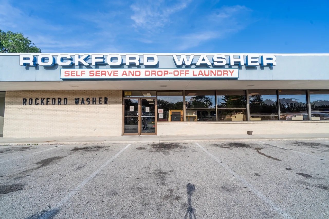 Front exterior of Rockford Washer with its vintage sign